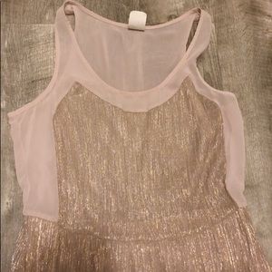 Long mesh dress with a v cut .